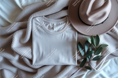 Folded shirt with hat mockup Product Image 1