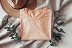 Folded peach shirt mockup Product Image 1