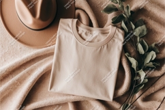 Folded shirt with hat mockup Product Image 1