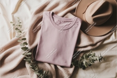 Folded shirt with hat mockup Product Image 1