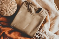 Folded shirt on a blanket mockup Product Image 1