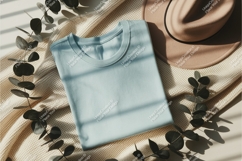 Folded shirt with hat mockup Product Image 1