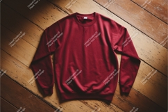 Red sweatshirt on wood floor mockup Product Image 1