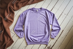 Purple sweatshirt on wood mockup Product Image 1
