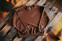 Brown sweatshirt on wood mockup Product Image 1
