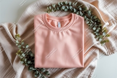 Folded peach shirt mockup Product Image 1