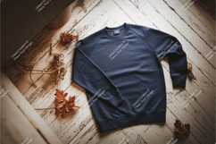 Blue long sleeved shirt on wood mockup Product Image 1