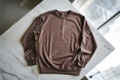 Brown sweatshirt on marble table mockup Product Image 1