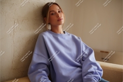 Woman poses in a sweatshirt mockup Product Image 1