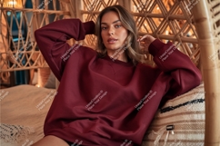 Woman in maroon sweatshirt mockup Product Image 1