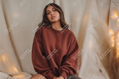 Woman poses in brown sweatshirt mockup Product Image 1