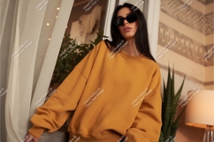 Woman in a yellow sweatshirt mockup Product Image 1