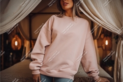 Woman in sweatshirt on bed mockup Product Image 1