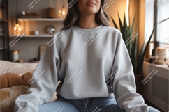Woman in a gray sweatshirt mockup Product Image 1