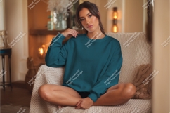 Woman in a teal sweatshirt mockup Product Image 1