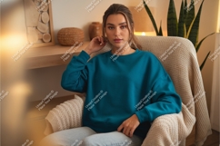 Woman in a sweatshirt sitting mockup Product Image 1