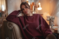 Woman in maroon sweatshirt mockup Product Image 1