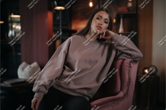 Woman in taupe sweatshirt mockup Product Image 1