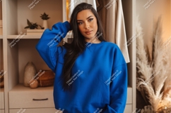 Woman in blue sweatshirt mockup Product Image 1