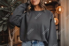 Woman in a gray sweatshirt mockup Product Image 1