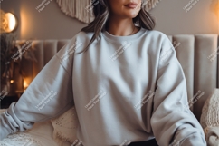 Woman sitting in gray sweatshirt mockup Product Image 1