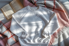 White sweatshirt with a book mockup Product Image 1
