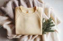 Folded sweatshirt on blanket mockup Product Image 1