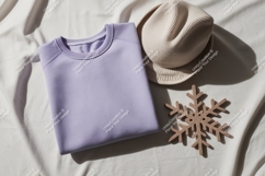 Folded sweatshirt with hat mockup Product Image 1