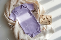 Purple baby bodysuit on blanket mockup Product Image 1