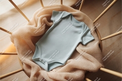 Blue baby onesie in wooden cot mockup Product Image 1