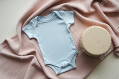 Baby bodysuit on pink fabric mockup Product Image 1