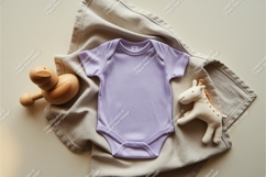 Blue baby onesie with toy mockup Product Image 1