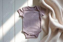 Baby bodysuit on wood surface mockup Product Image 1