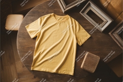 Yellow tshirt on wooden table mockup Product Image 1