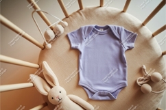 Baby onesie with bunny on crib mockup Product Image 1