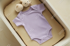 Baby bodysuit with stuffed toy mockup Product Image 1