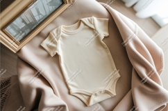Beige baby onesie on blanket mockup Product Image 1