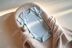 Blue baby bodysuit on a blanket mockup Product Image 1
