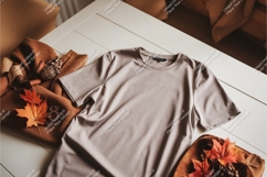 Beige tshirt on a table mockup Product Image 1