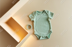 Mint baby bodysuit with rattle mockup Product Image 1