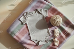 Gray baby onesie with blanket and yarn mockup Product Image 1
