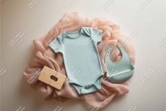 Baby bodysuit with a bib and toy mockup Product Image 1
