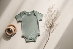 Green baby onesie with wooden toy mockup Product Image 1
