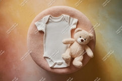 Baby bodysuit and teddy bear on cushion mockup Product Image 1