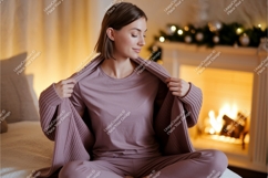 Woman cozy lounge wear by fireplace pajamas Product Image 1