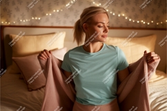Woman cozying up with blanket indoors Product Image 1
