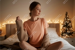 Woman wearing peach t shirt and brown cardigan Product Image 1
