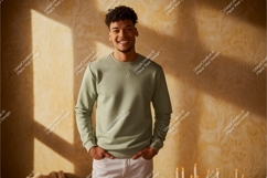 Man wearing green sweatshirt and white pants Product Image 1