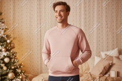 Man wearing pink sweatshirt with Christmas tree Product Image 1