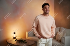 Man wearing peach sweatshirt indoors casual Product Image 1
